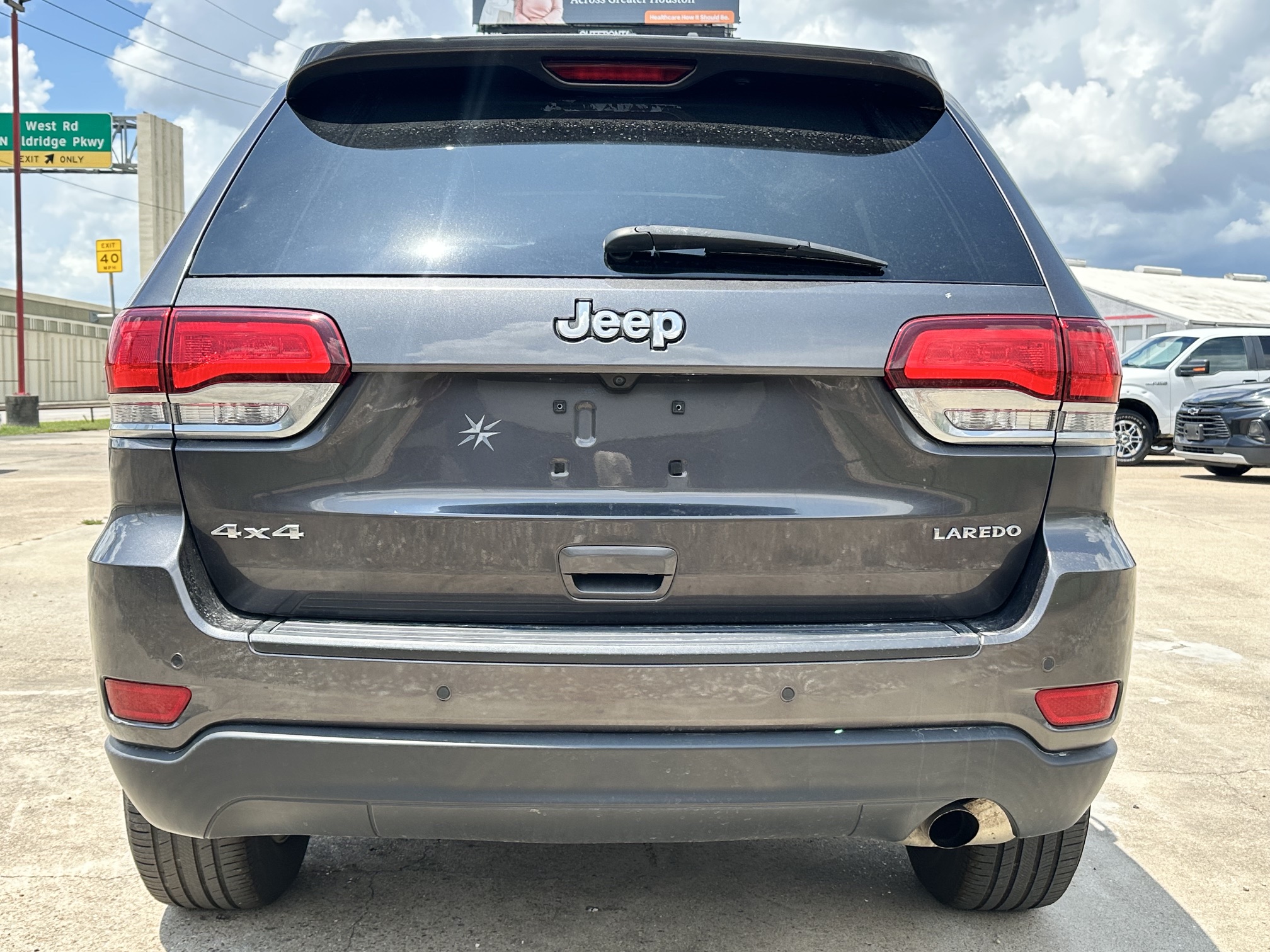 2021 JEEP GRAND CHEROKEE LAREDO used vehicle for sale in Houston