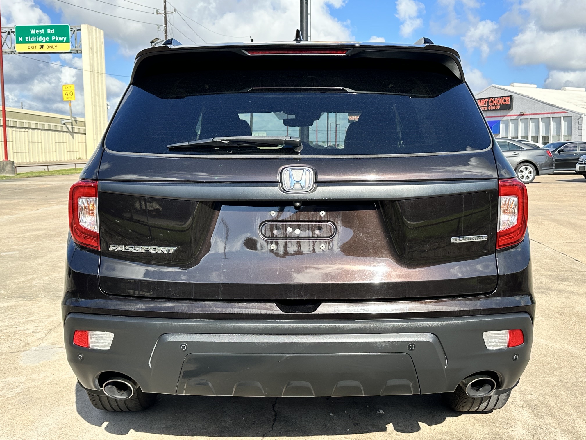 2020 HONDA PASSPORT TOURING used vehicle for sale in Houston
